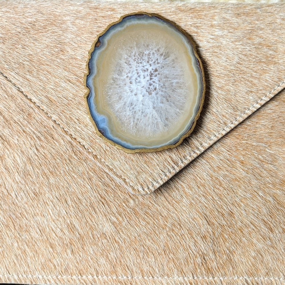Tan hide clutch